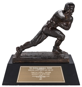 1987 Heisman Trophy Presented To Tim Brown of Notre Dame - The First Ever Wide Receiver To Win The Award & 1 of 9 Pro Football Hall of Famers To Win The Heisman! (Tim Brown LOA)
